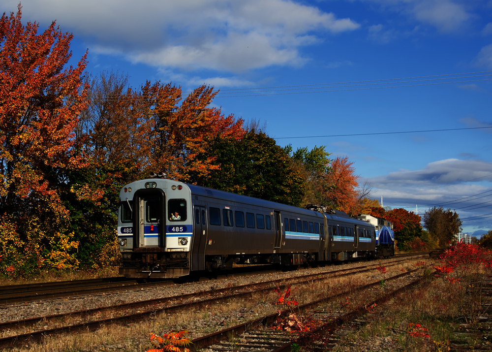 Two passenger cars and diesel locomotive