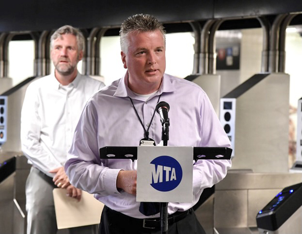 Man speaking at podium