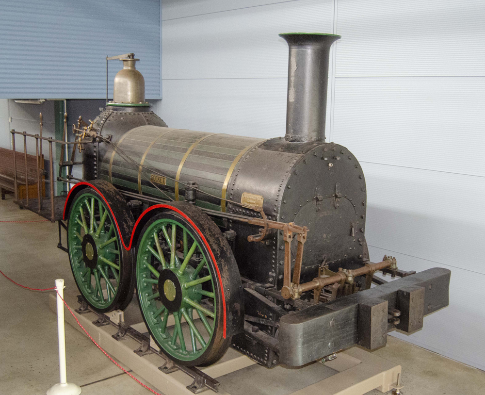 Four-wheel steam locomotive in building
