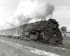Steam Chicago & North Western locomotives with speeding train