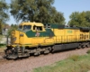 Yellow-and-green Chicago & North Western locomotives without a train
