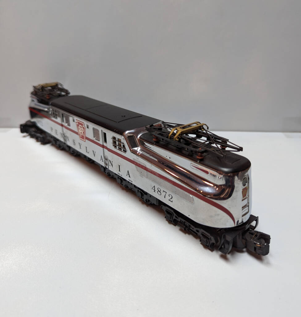 electric model train on white paper