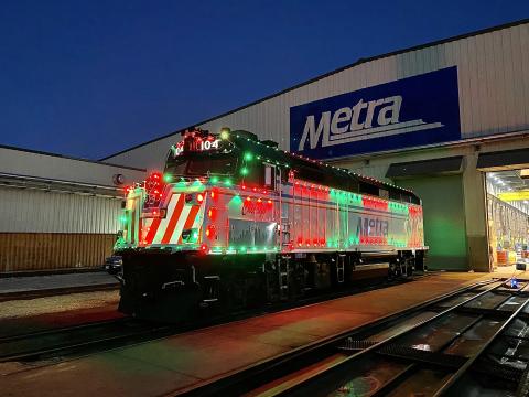 Commuter locomotive with holiday lights
