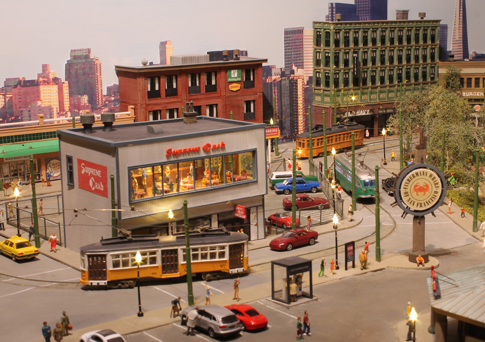 city scene with structure on model train layout