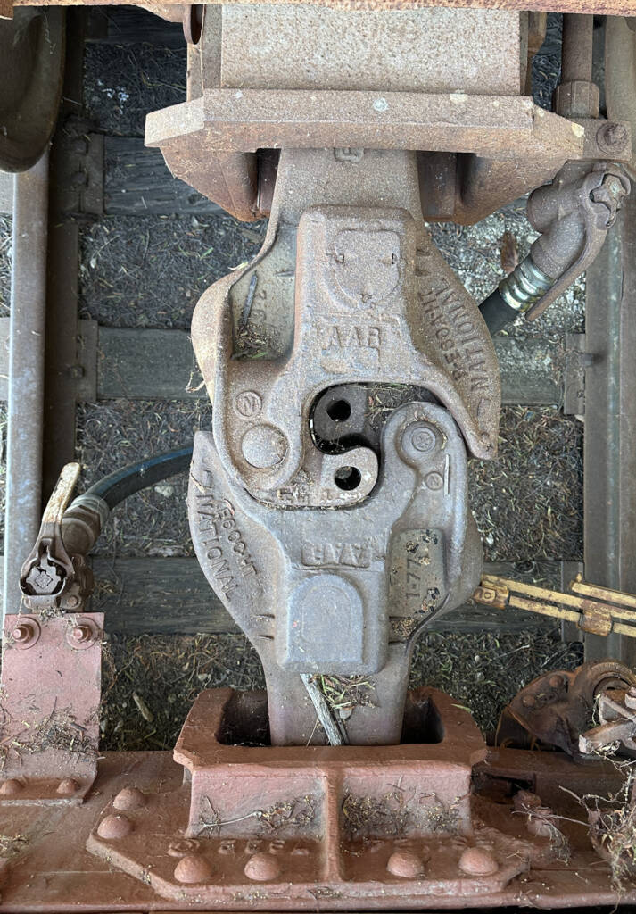 metal device to connect train cars