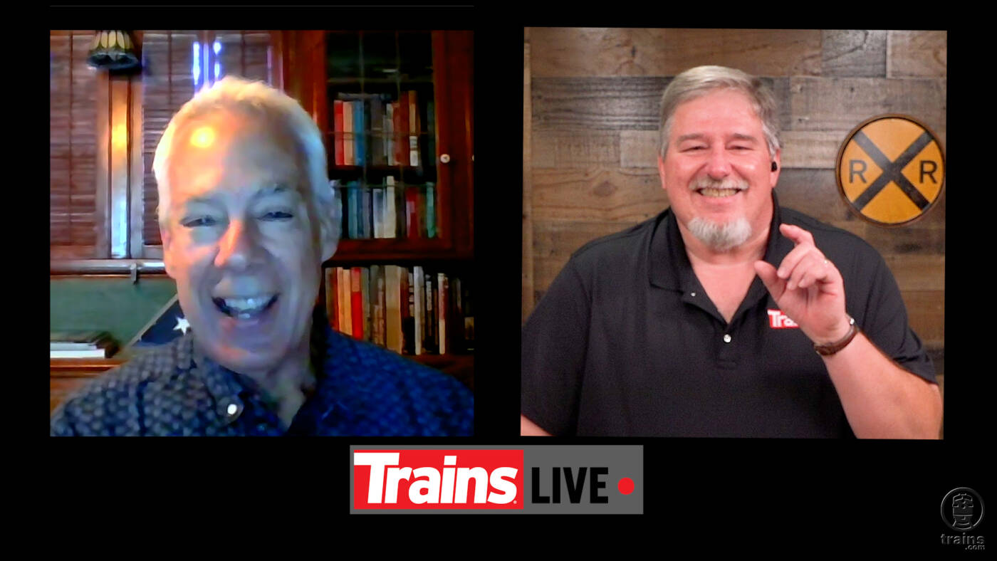 Two smiling men in a TV interview setting. Museum of the American Railroad