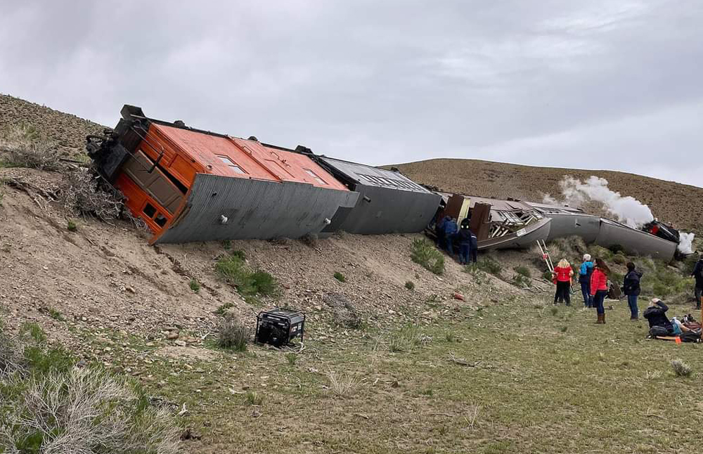 Overturned passenger cars on embankment