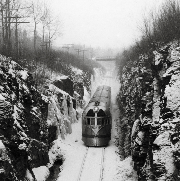 Streamlined passenger train in snow