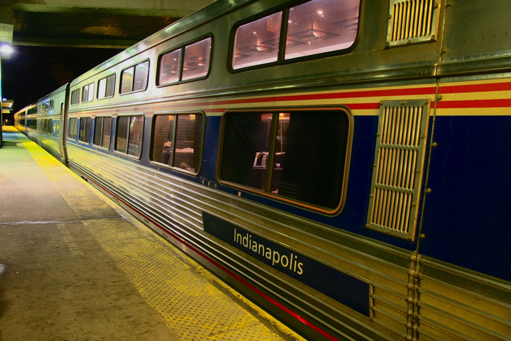 Dining car at high-level station platform at night