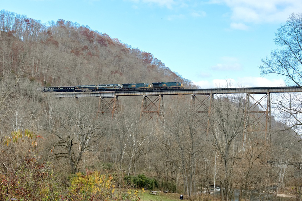 Train on large bridge