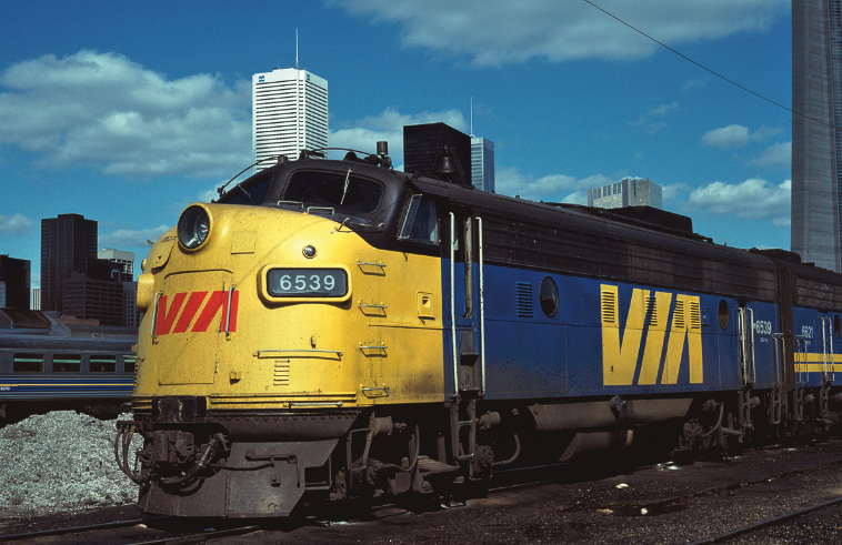 Blue FP9A locomotive with yellow nose