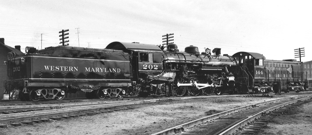 Steam locomotive with end-cab diesel