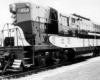 Two tone diesel Wabash locomotives in field with no train