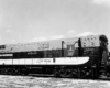 Two tone diesel Wabash locomotives in field with no train