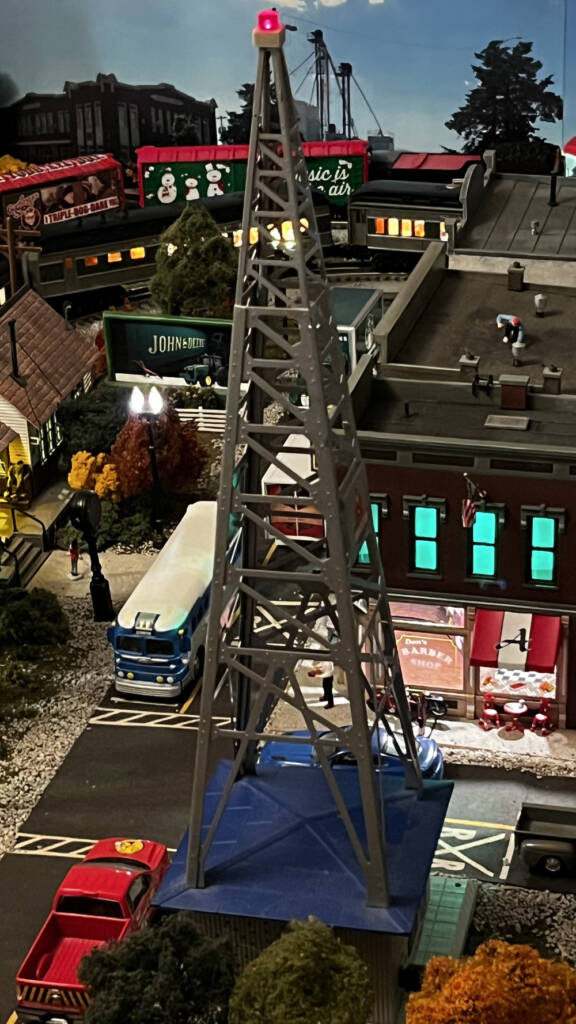 photo of toy train layout with tower