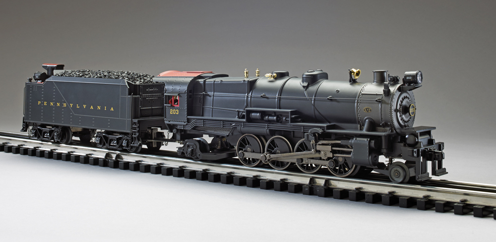 Model steam engine on track