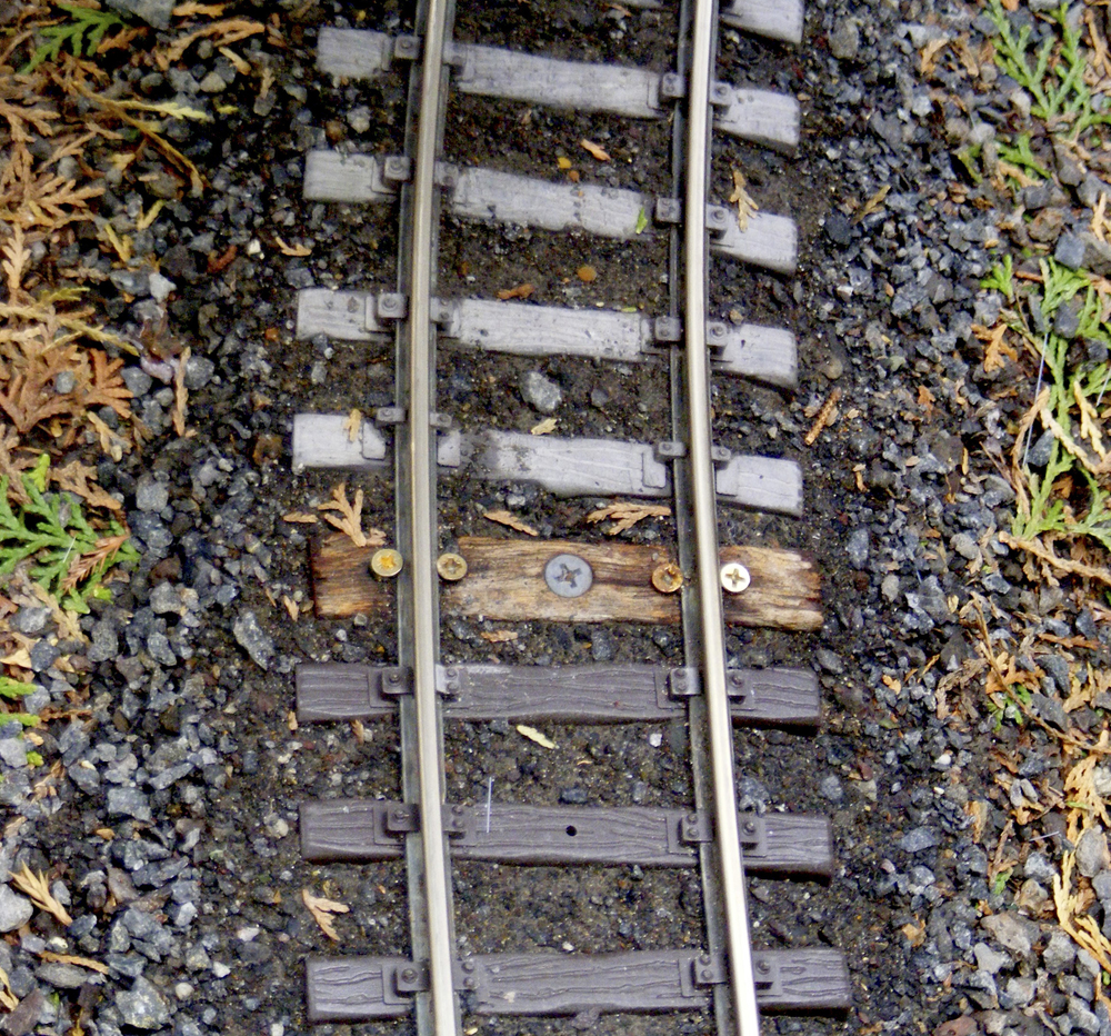 close up of outdoor model track: Five track and roadbed tips