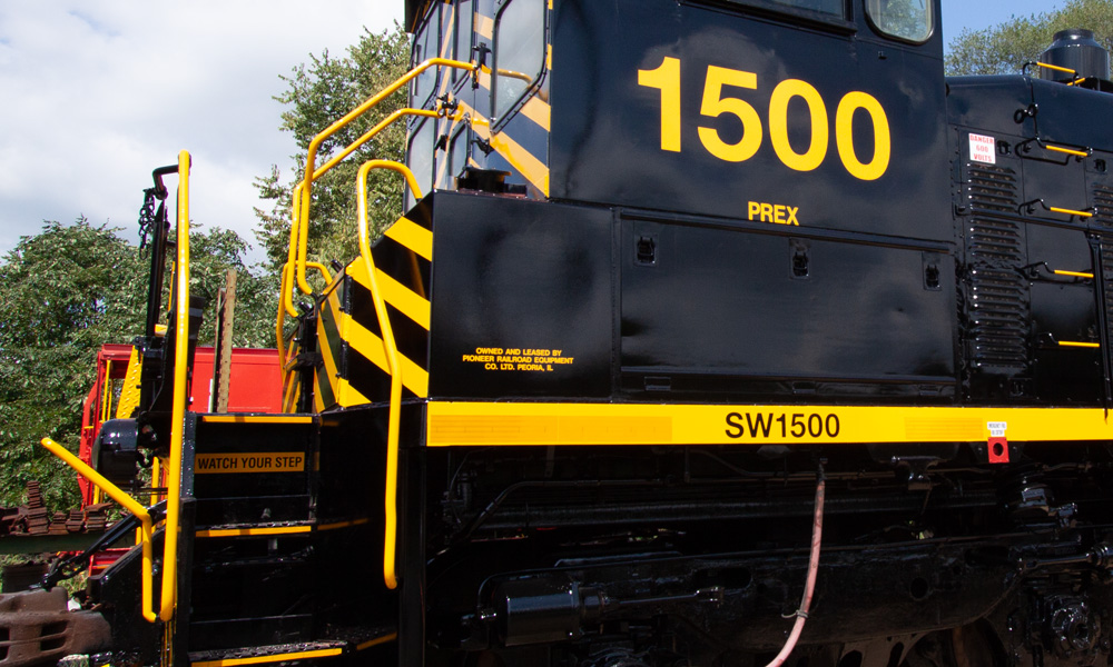 Close-up of yellow lettering on a black diesel switcher