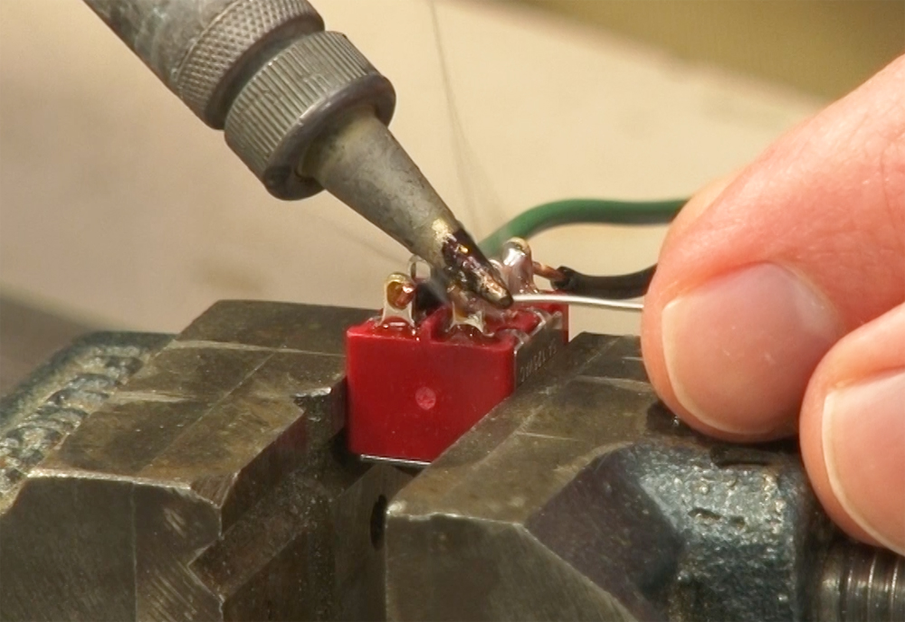 Photo showing solder being applied.