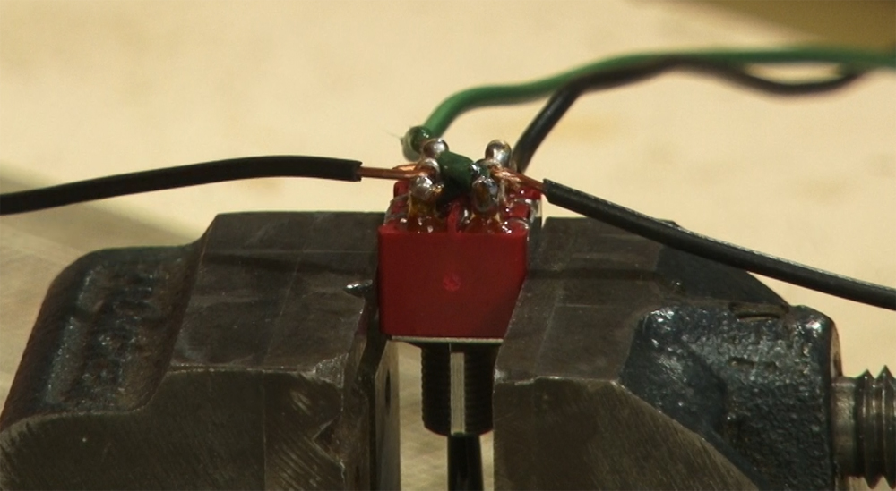 Image showing wires attached to center poles on DPDT switch.