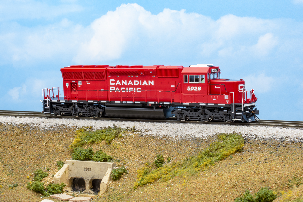 A model locomotive in a red paint scheme