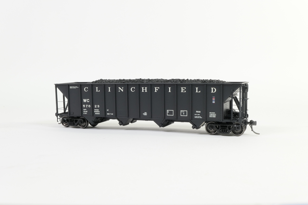A model freight car in a black paint scheme