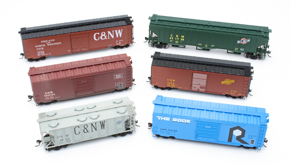 Color photo of six HO scale freight cars.
