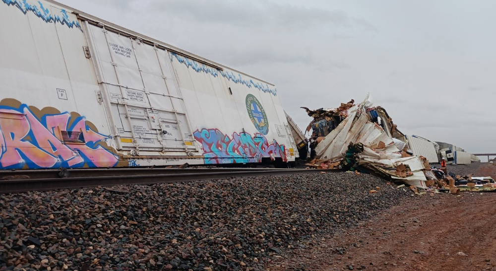 Derailed and damaged freight cars