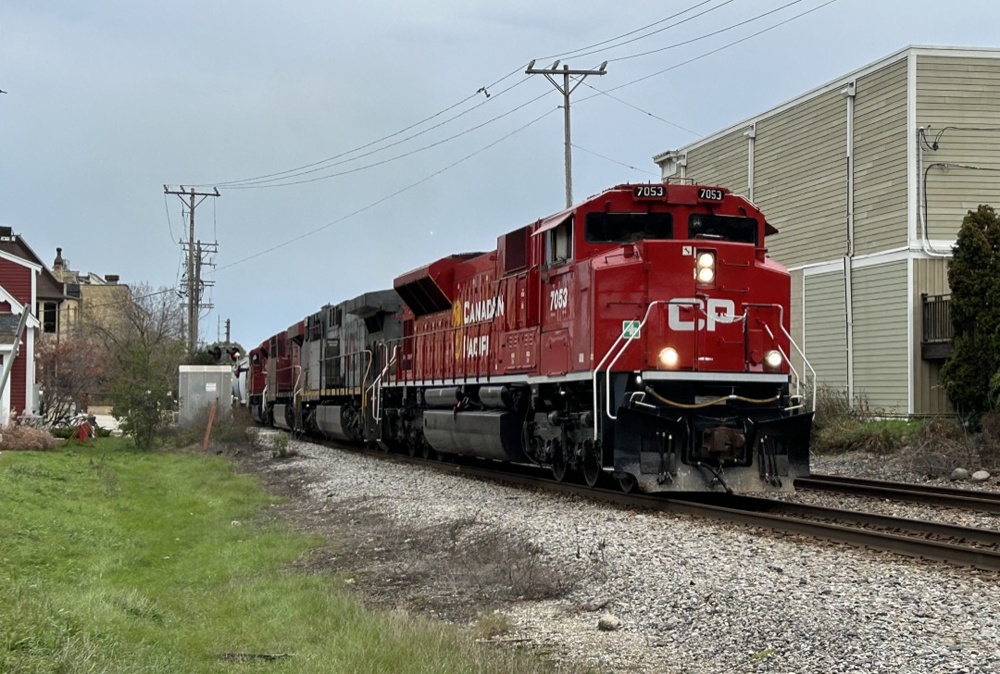Red and gray locomotives on freight train