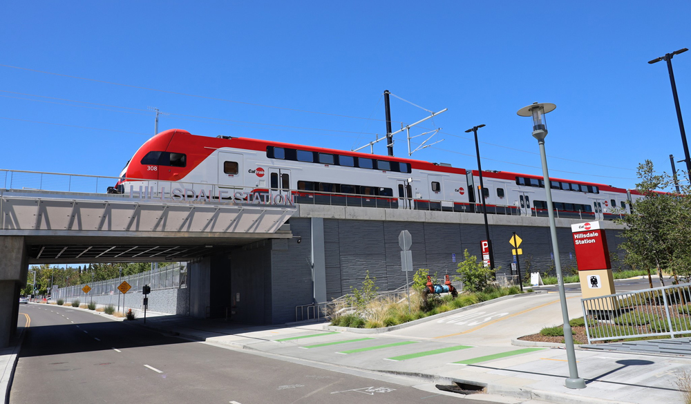 Caltrain electric trainset passes through station