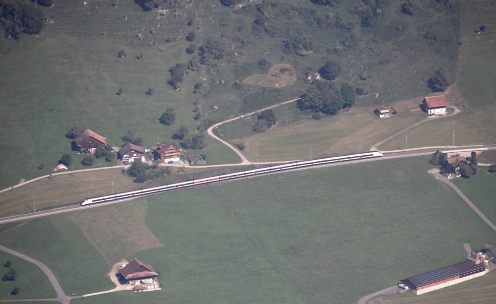View from mountain of train in valley