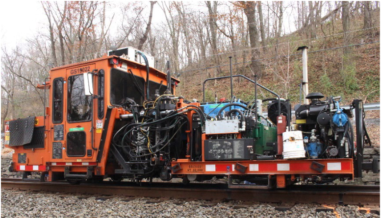 Orange maintenance-of-way machinery