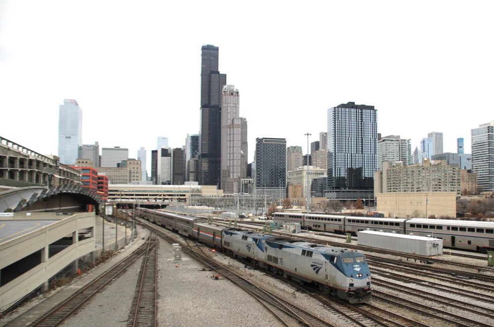 Passenger train with Chicago skyline in background