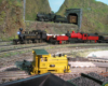 three model locomotives on layout