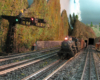 model steam train with headlight on layout