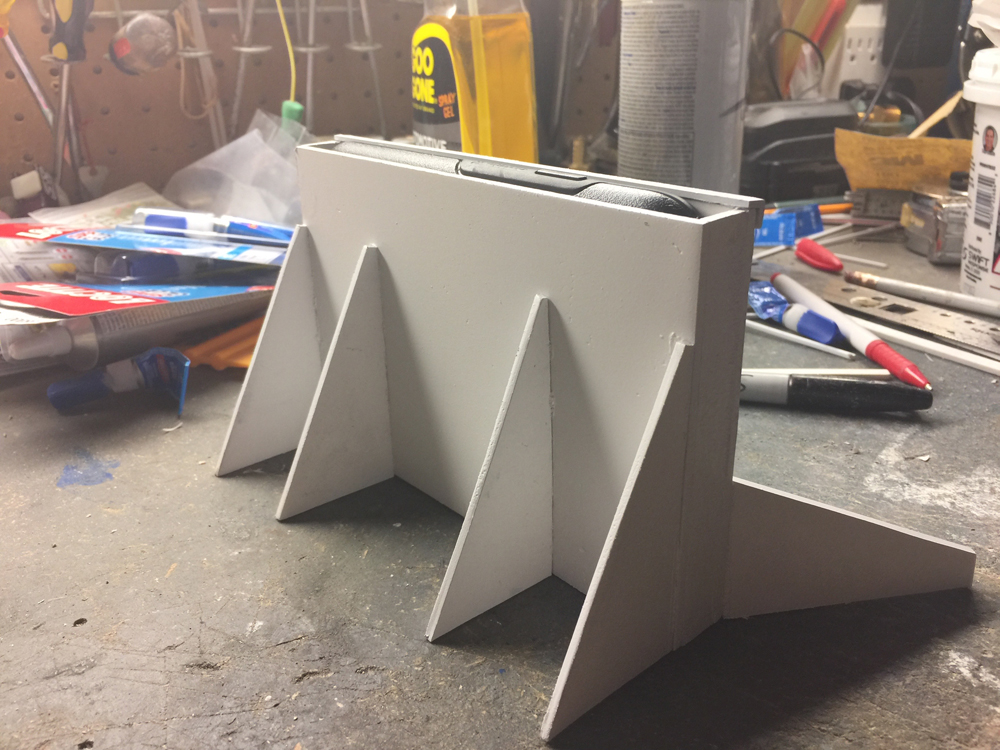A styrene enclosure with triangular supports around it