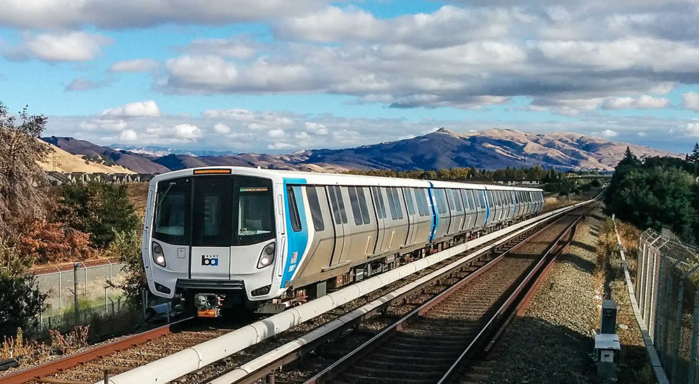 New transit train with mountains in background