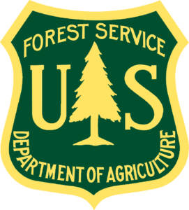 Yellow and green shield logo