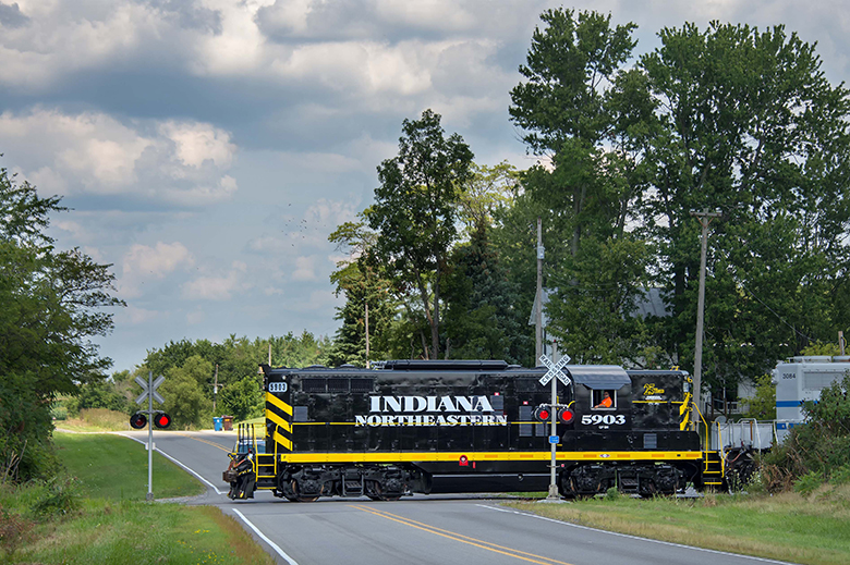 train going through crossing