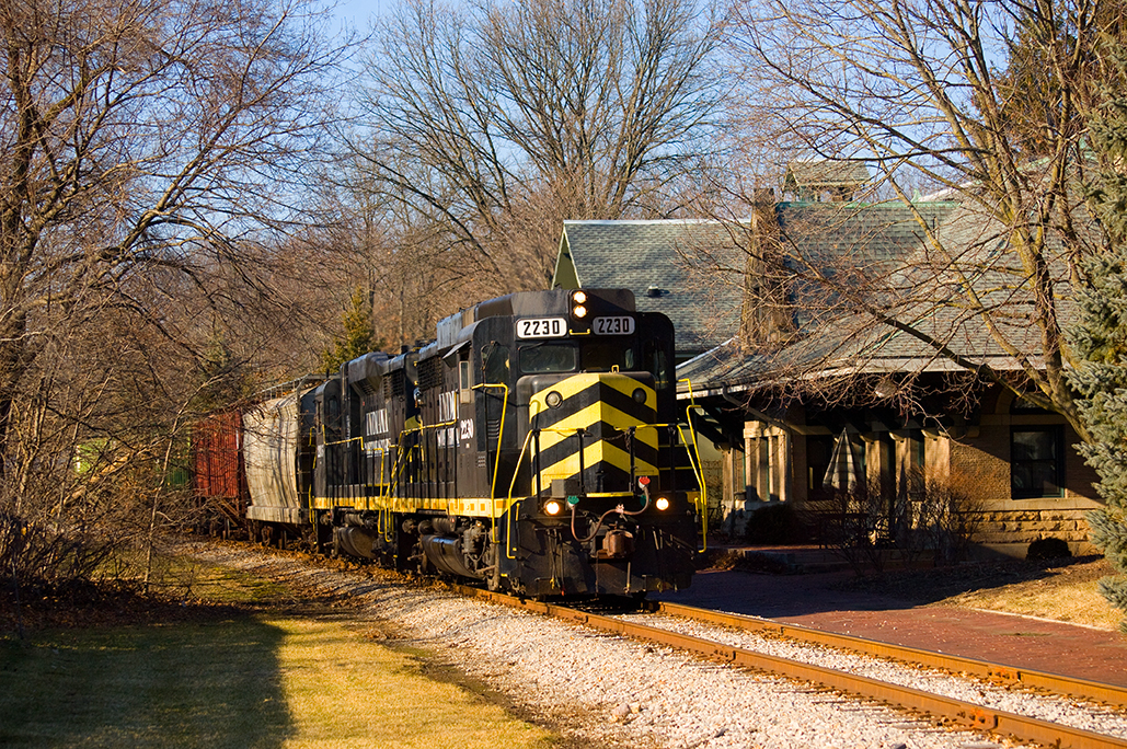 black locomotives with yellow stripes