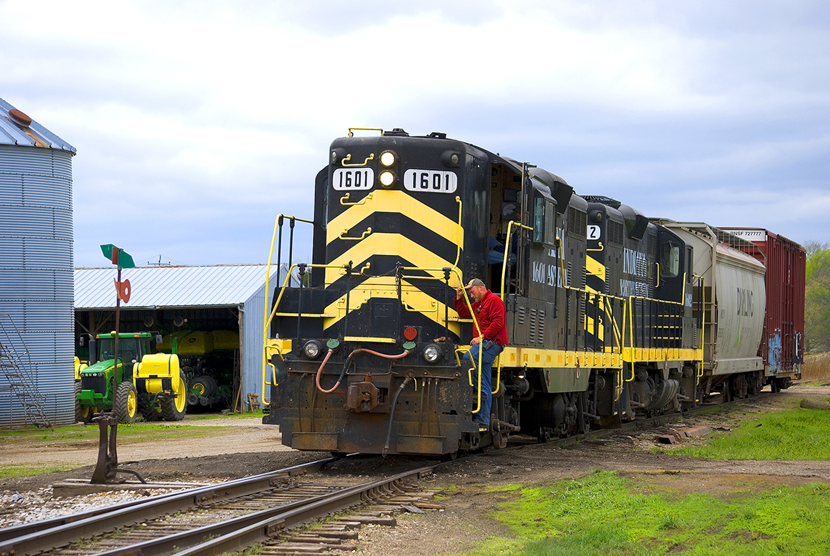 black locomotive with yellow stripes