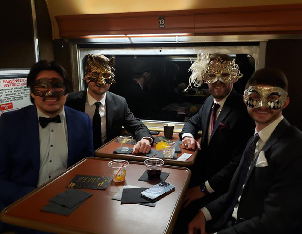 train guests wearing masks