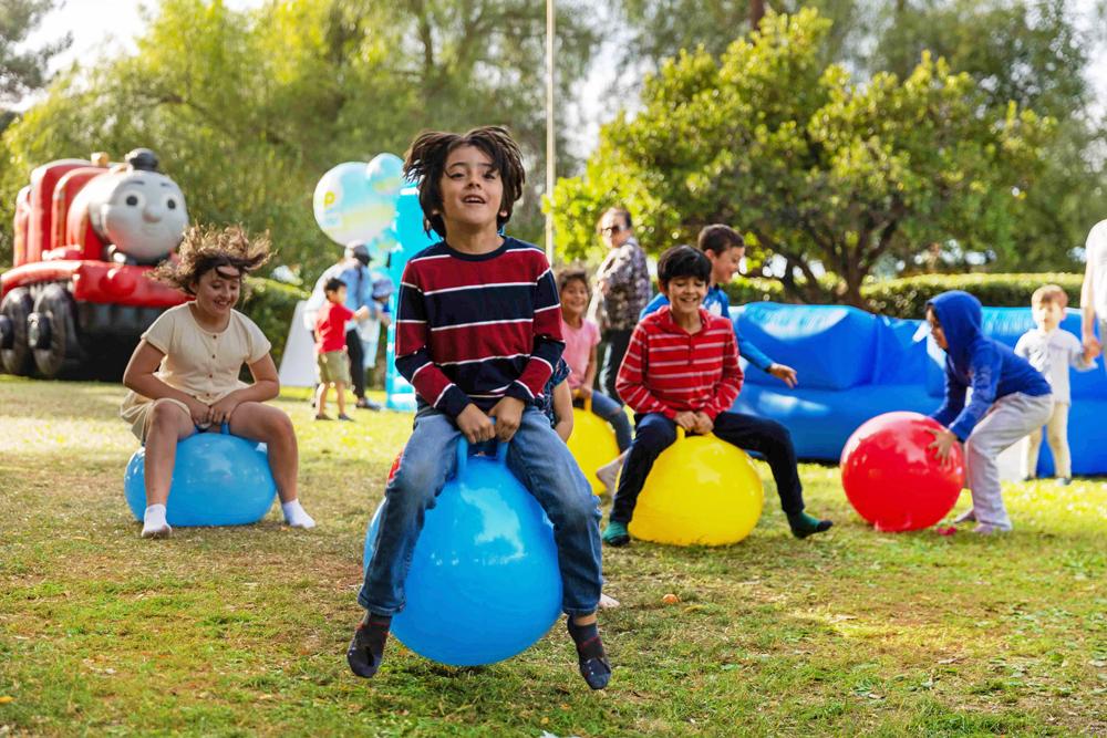 kids on bouncing balls