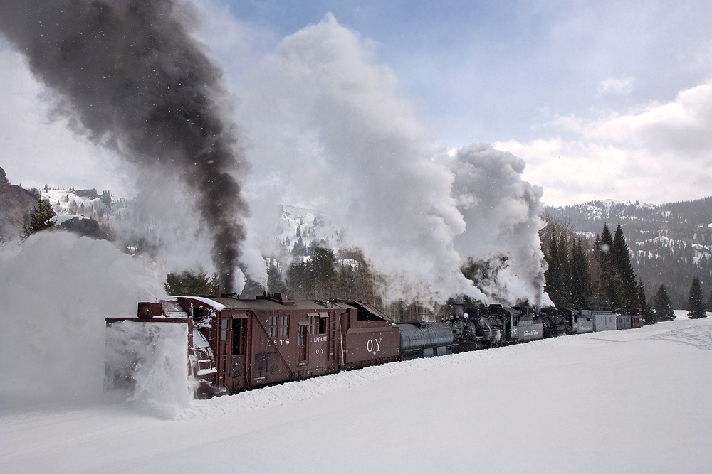 rotary on track throwing snow all over