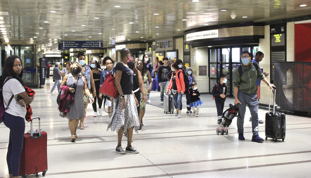 People in concourse of railroad station