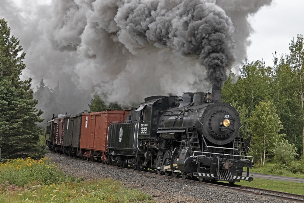 Steam engine with period freight cars