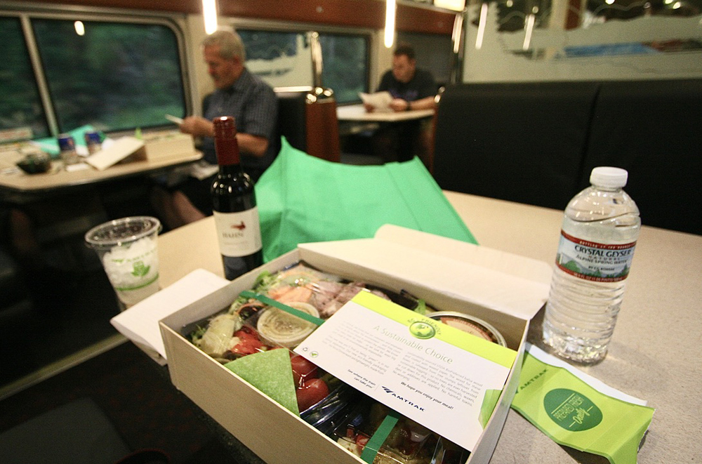 Food in box and green cloth bag