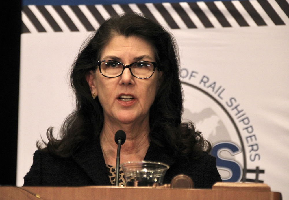 Woman speaking at podium