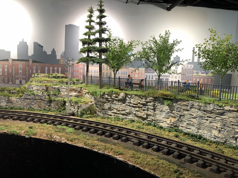 corner scene of model railway with trees