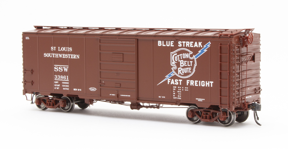 Color photo of HO scale boxcar painted brown with white and blue graphics.